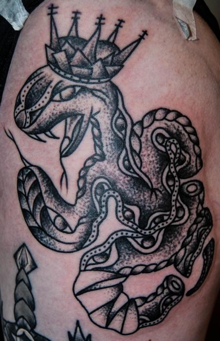 Waarden van tatoeages: slangen en hun symbolen